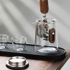 Outdoor tea brewing glass teapot and cups